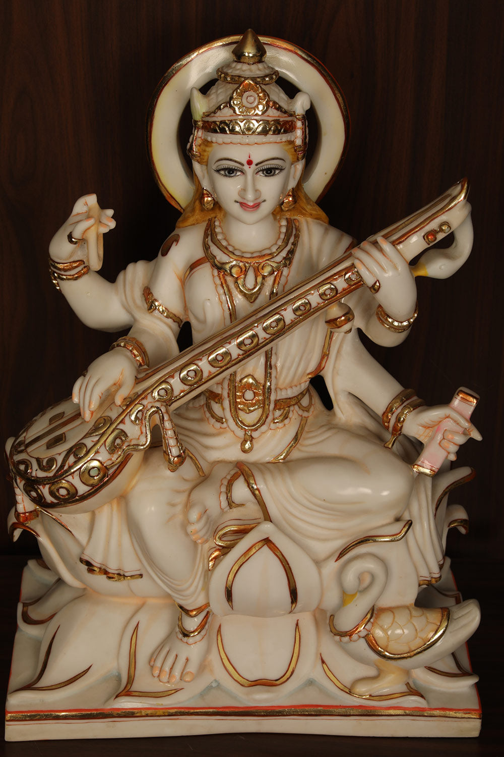 Collection of Cultured Marble Goddess Saraswati Statue in a gallery layout