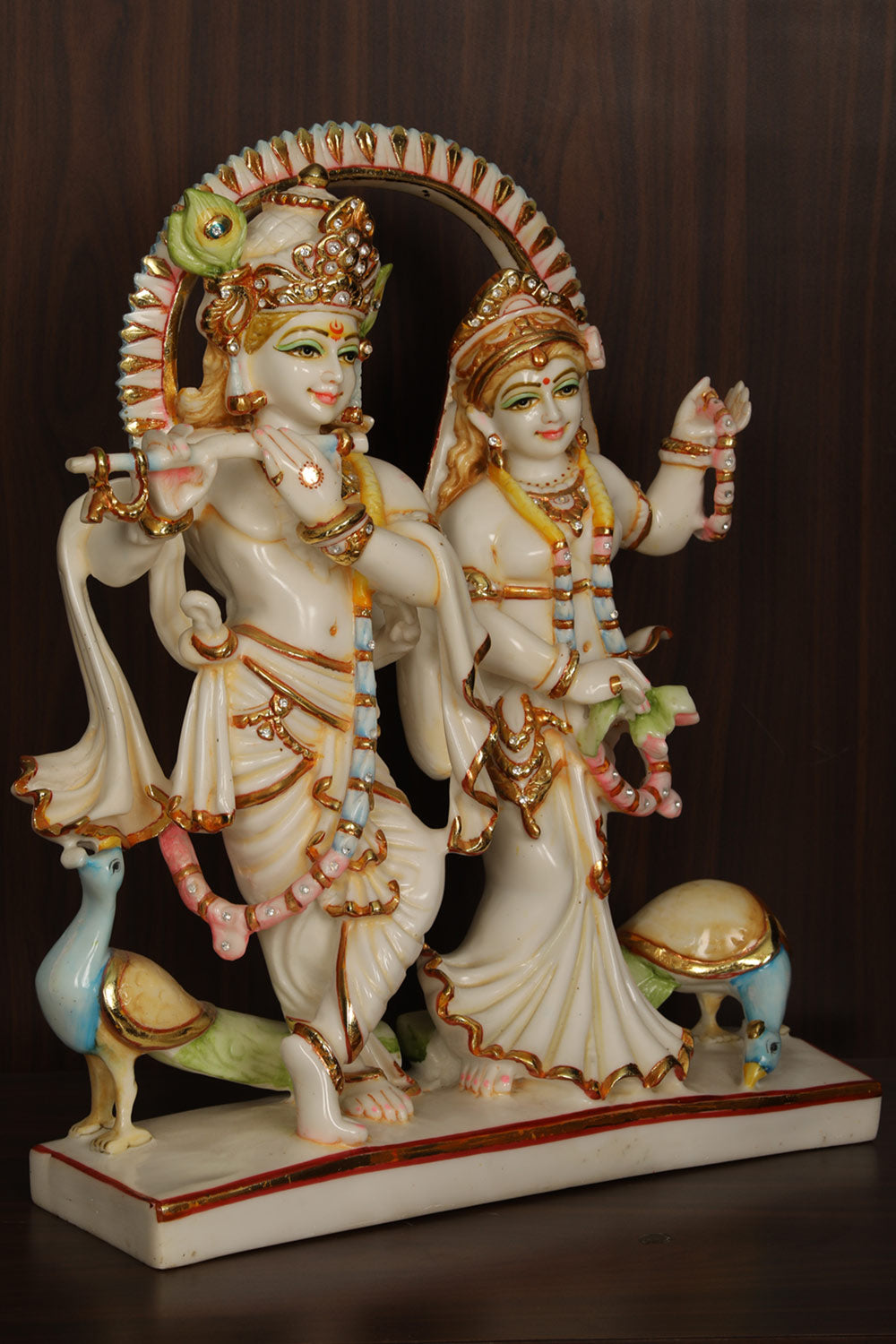 Collection of Cultured Marble Radha Krishna Statue in a gallery layout