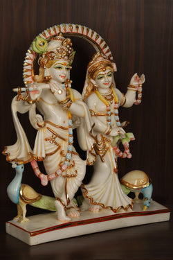 Collection of Cultured Marble Radha Krishna Statue in a gallery layout