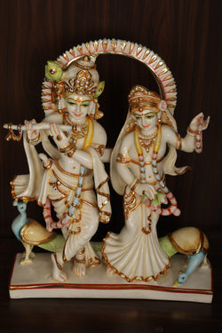 Collection of Cultured Marble Radha Krishna Statue in a gallery layout