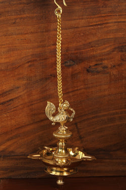 Collection of Brass Mehnoor Casted Hanging Oil Lamp in a gallery layout