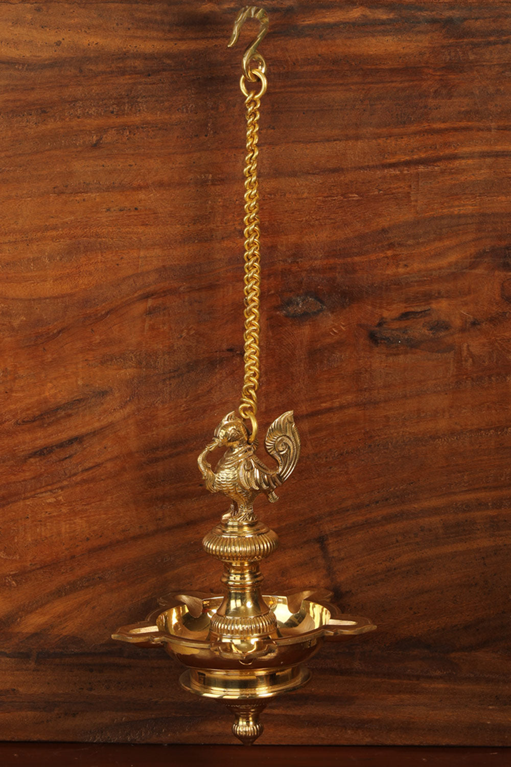 Collection of Brass Mehnoor Casted Hanging Oil Lamp in a gallery layout