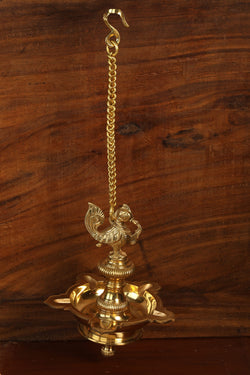 Collection of Brass Mehnoor Casted Hanging Oil Lamp in a gallery layout