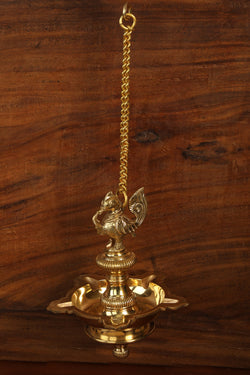 Collection of Brass Mehnoor Casted Hanging Oil Lamp in a gallery layout