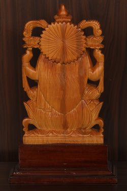 Image of Shutters Wood Goddess Vishu Priya Lakshmi Idol