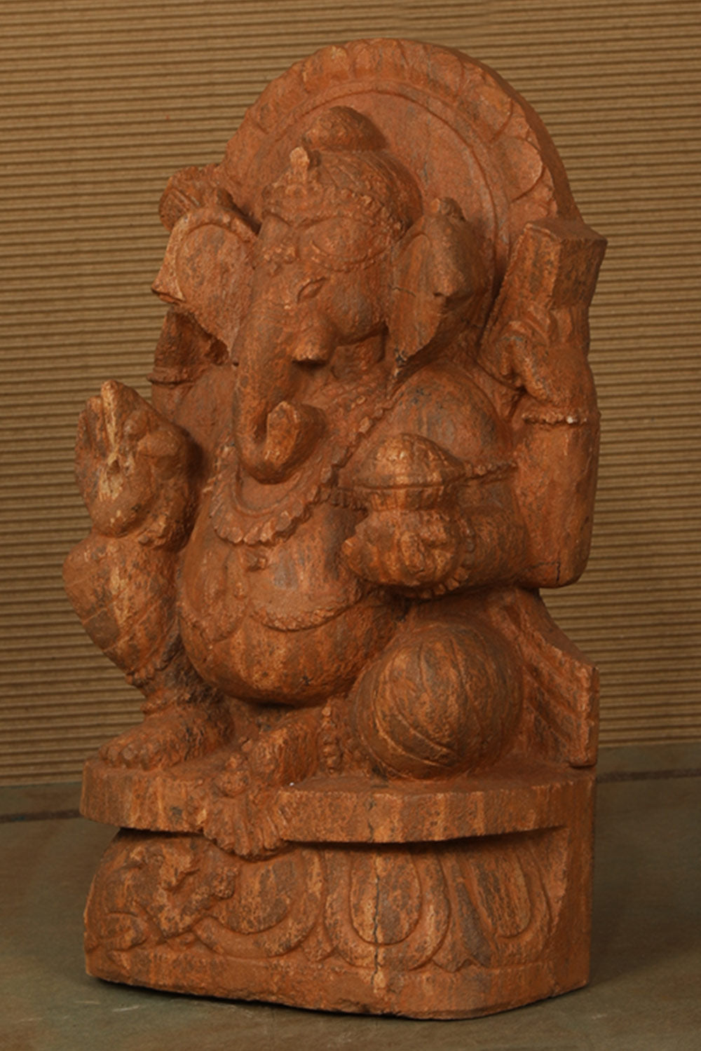 Collection of Ganesh Red Sunstone Statue in a gallery layout