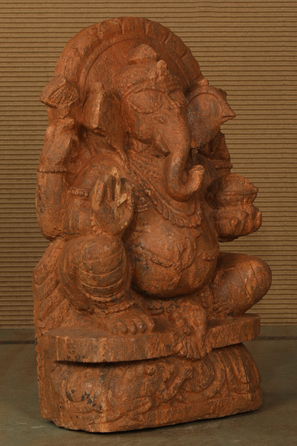 Collection of Ganesh Red Sunstone Statue in a gallery layout