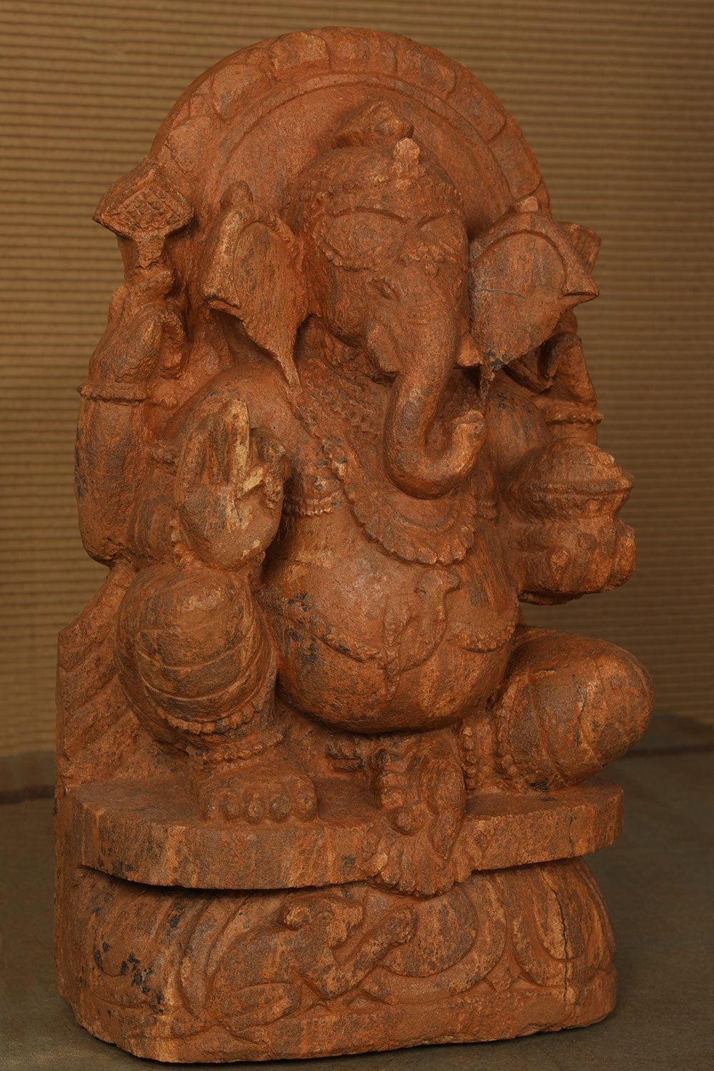 Collection of Ganesh Red Sunstone Statue in a gallery layout