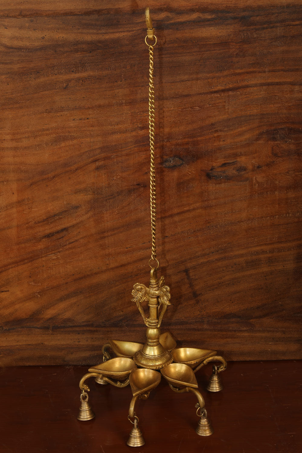 Collection of Antique Brass Mehnoor Casted Hanging Oil Lamp in a gallery layout