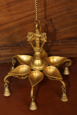 Collection of Antique Brass Mehnoor Casted Hanging Oil Lamp in a gallery layout