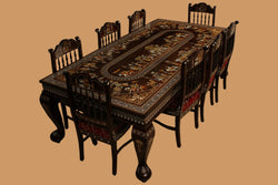 Collection of Rosewood Inlay dining table with 8 carved chairs in a gallery layout