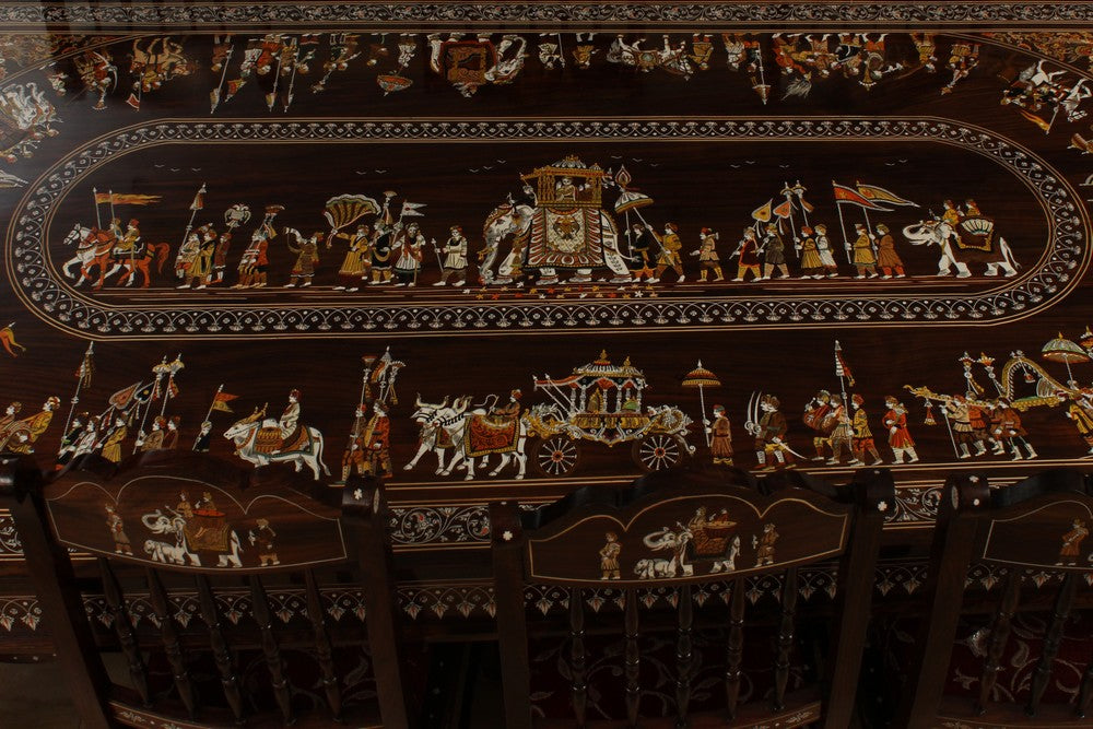 Collection of Rosewood Inlay dining table with 8 carved chairs in a gallery layout