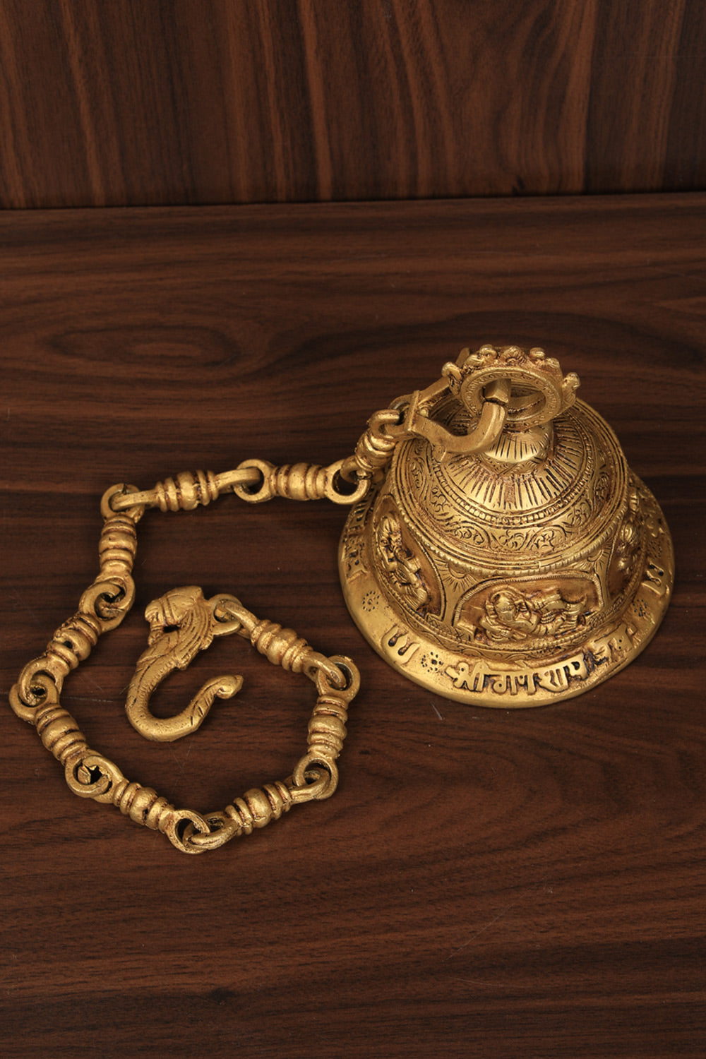 Collection of Brass Ganesh Handling Bell in a gallery layout