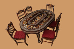 Collection of Rosewood Inlay dining table with 6 carved chairs in a gallery layout