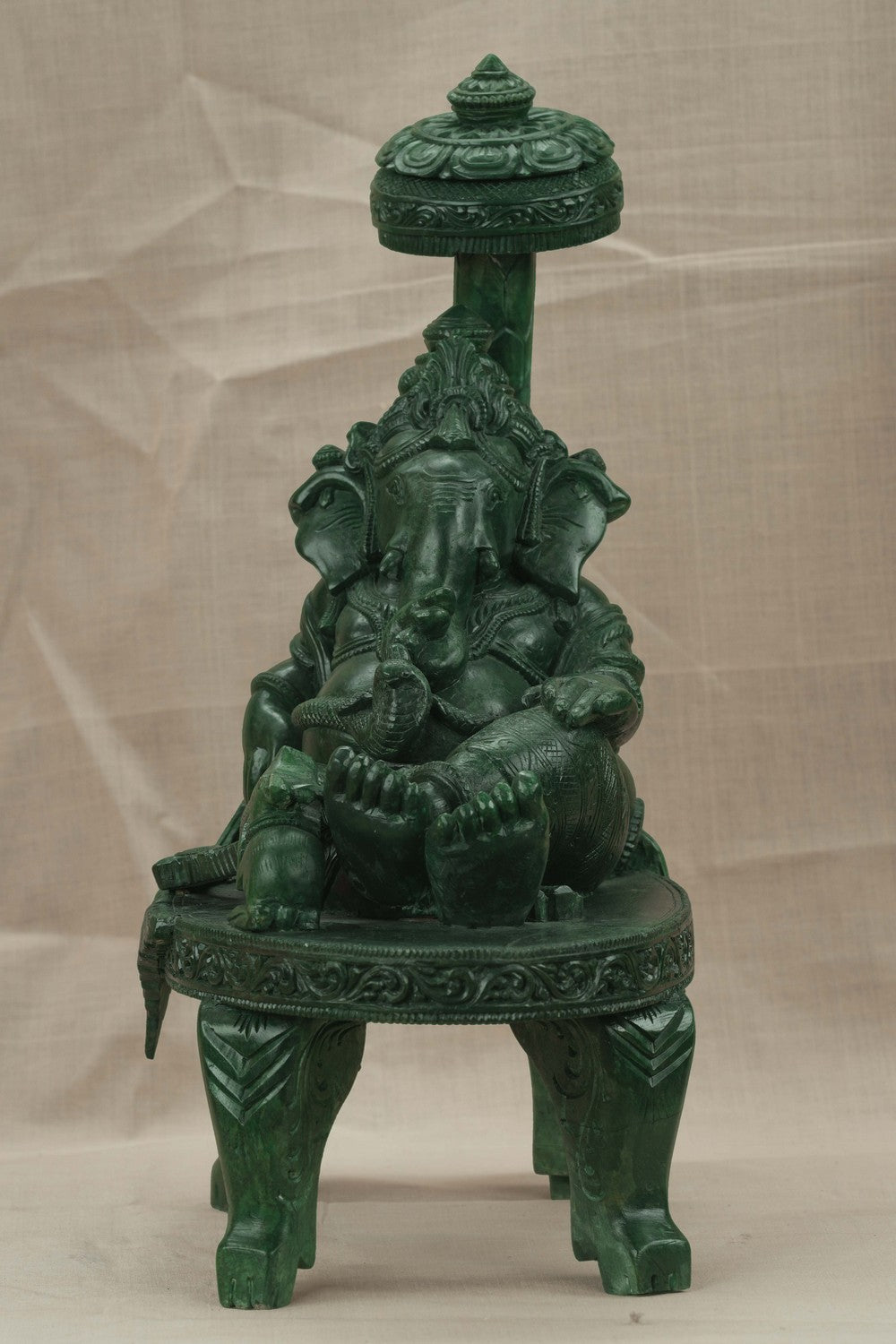 Image of A Green-painted Serpent Stone Ganesh