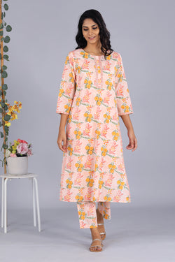 Collection of Hand block printed orange kurti and pants set in a gallery layout