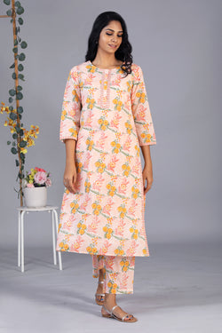 Collection of Hand block printed orange kurti and pants set in a gallery layout