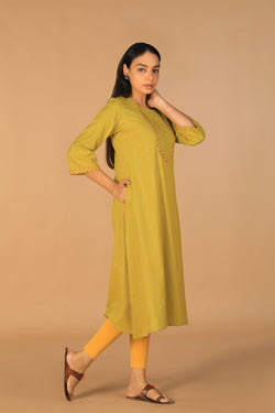 Collection of Pear green embroidered cotton Kurti in a gallery layout