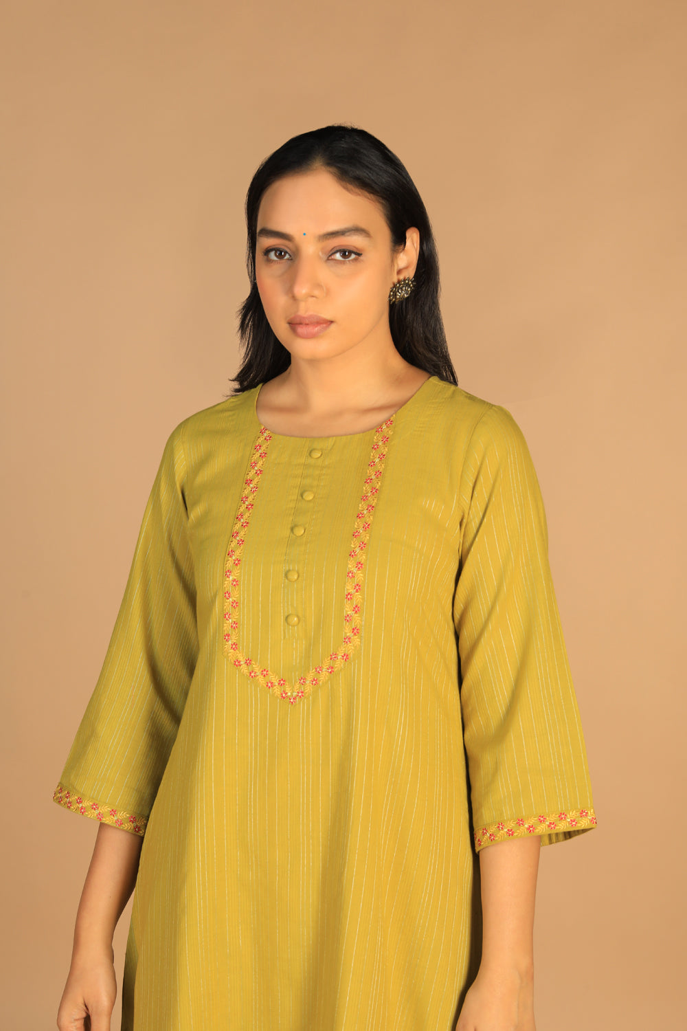 Collection of Pear green embroidered cotton Kurti in a gallery layout