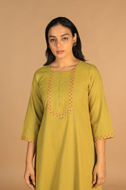 Collection of Pear green embroidered cotton Kurti in a gallery layout