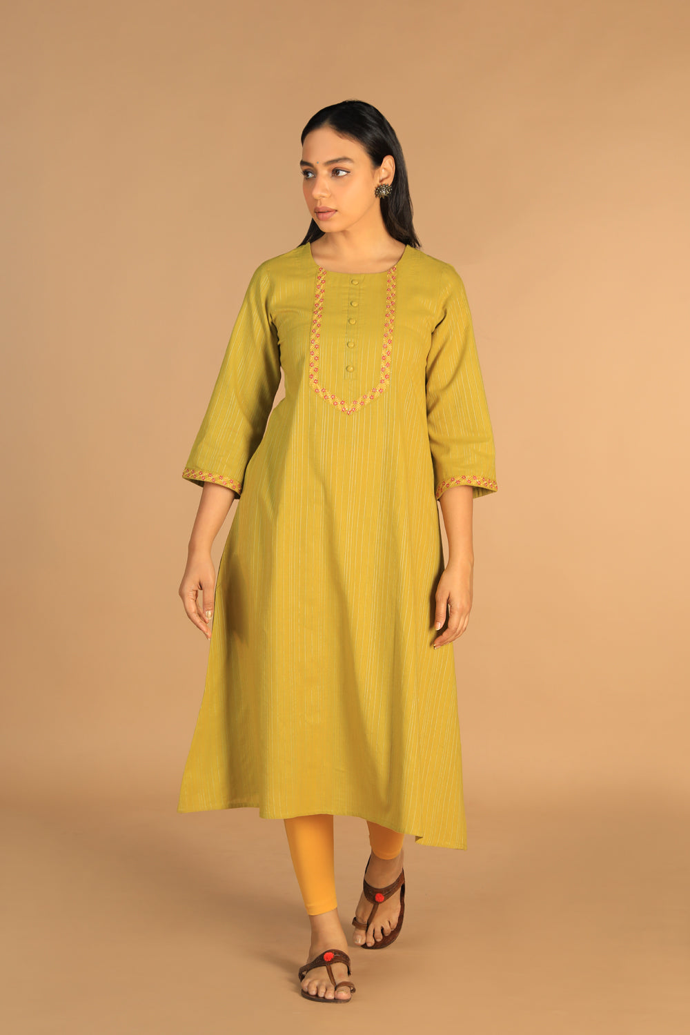 Collection of Pear green embroidered cotton Kurti in a gallery layout