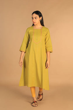 Collection of Pear green embroidered cotton Kurti in a gallery layout