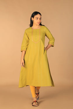 Collection of Pear green embroidered cotton Kurti in a gallery layout