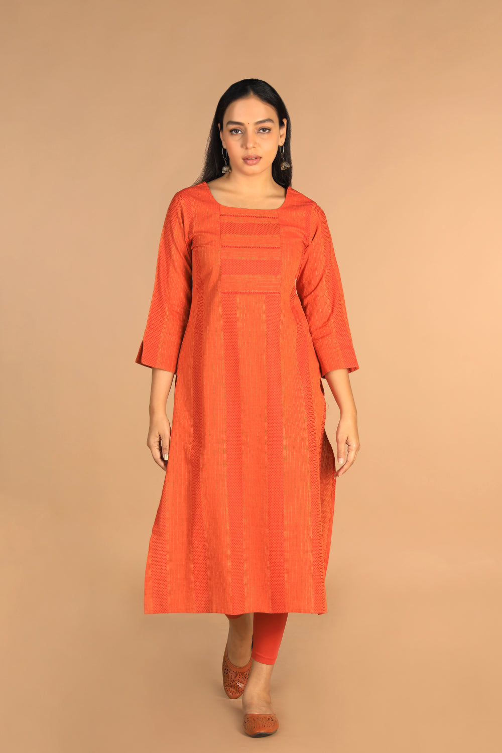 Collection of Marigold orange woven cotton kurti in a gallery layout