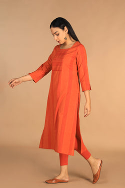 Collection of Marigold orange woven cotton kurti in a gallery layout