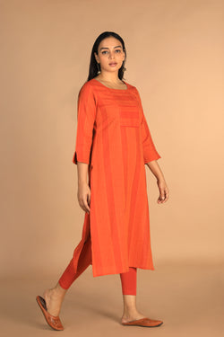 Collection of Marigold orange woven cotton kurti in a gallery layout