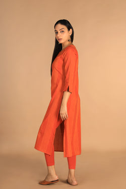 Collection of Marigold orange woven cotton kurti in a gallery layout