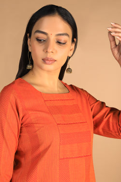 Collection of Marigold orange woven cotton kurti in a gallery layout