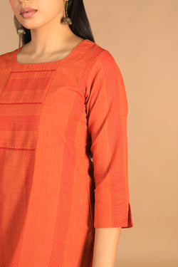 Collection of Marigold orange woven cotton kurti in a gallery layout