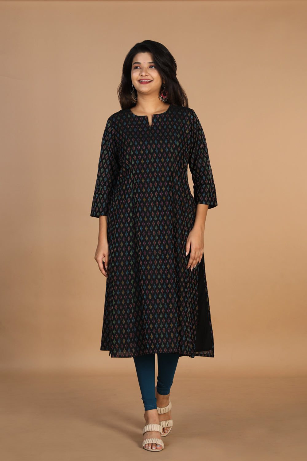 Collection of Silk pochampally Ikat kurti in a gallery layout