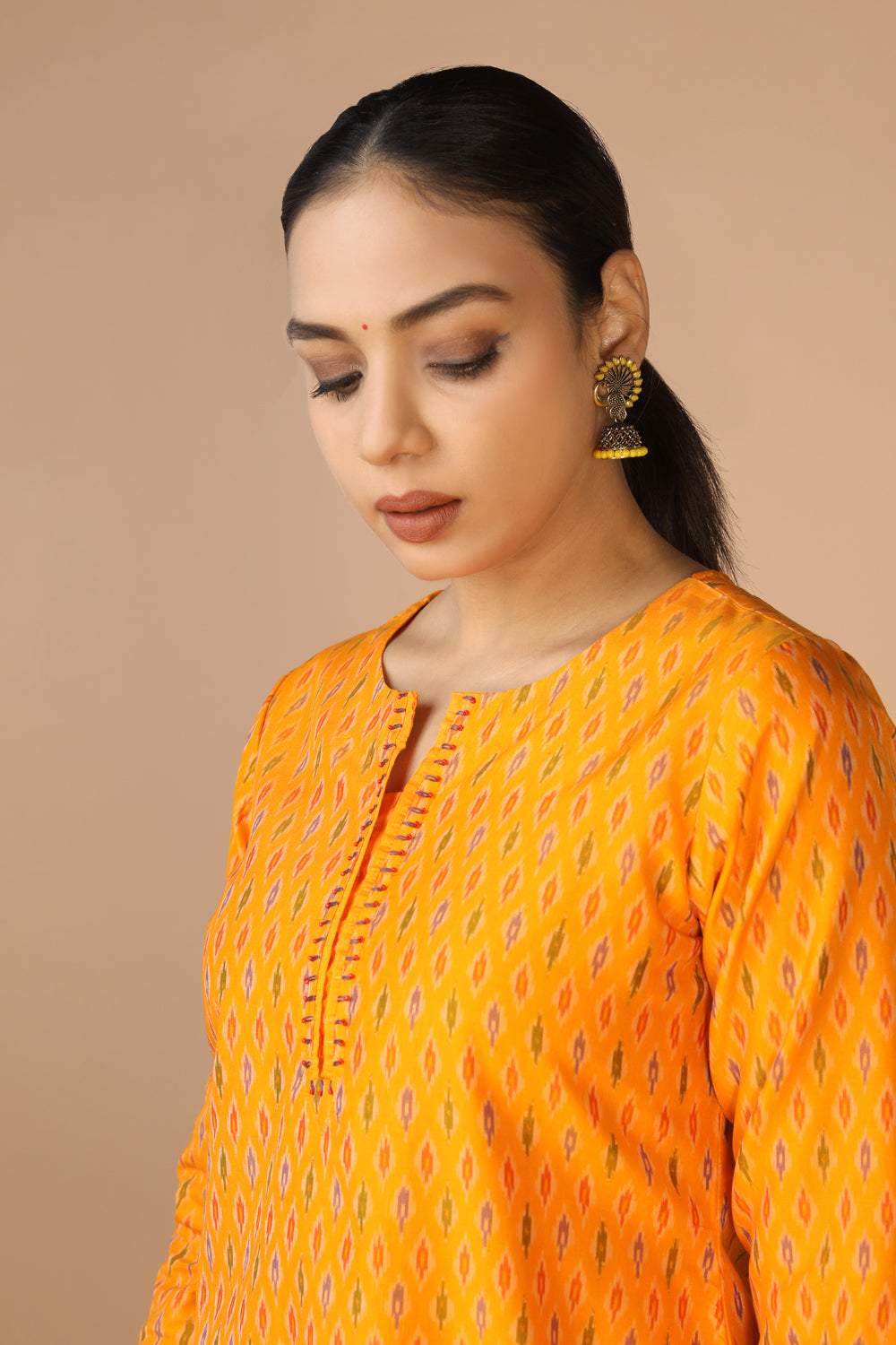 Image of Mustard Yellow Handwoven Cotton Pochampally Ikat Kurti