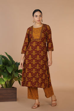 Collection of Bagh Handblock printed Kurta and pants set in a gallery layout