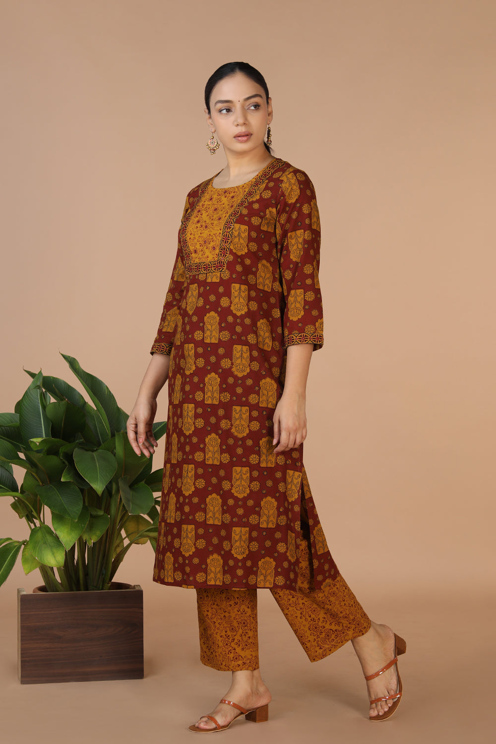 Collection of Bagh Handblock printed Kurta and pants set in a gallery layout