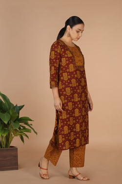 Collection of Bagh Handblock printed Kurta and pants set in a gallery layout