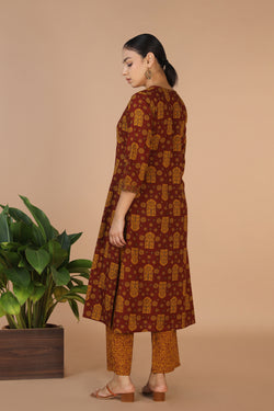 Collection of Bagh Handblock printed Kurta and pants set in a gallery layout