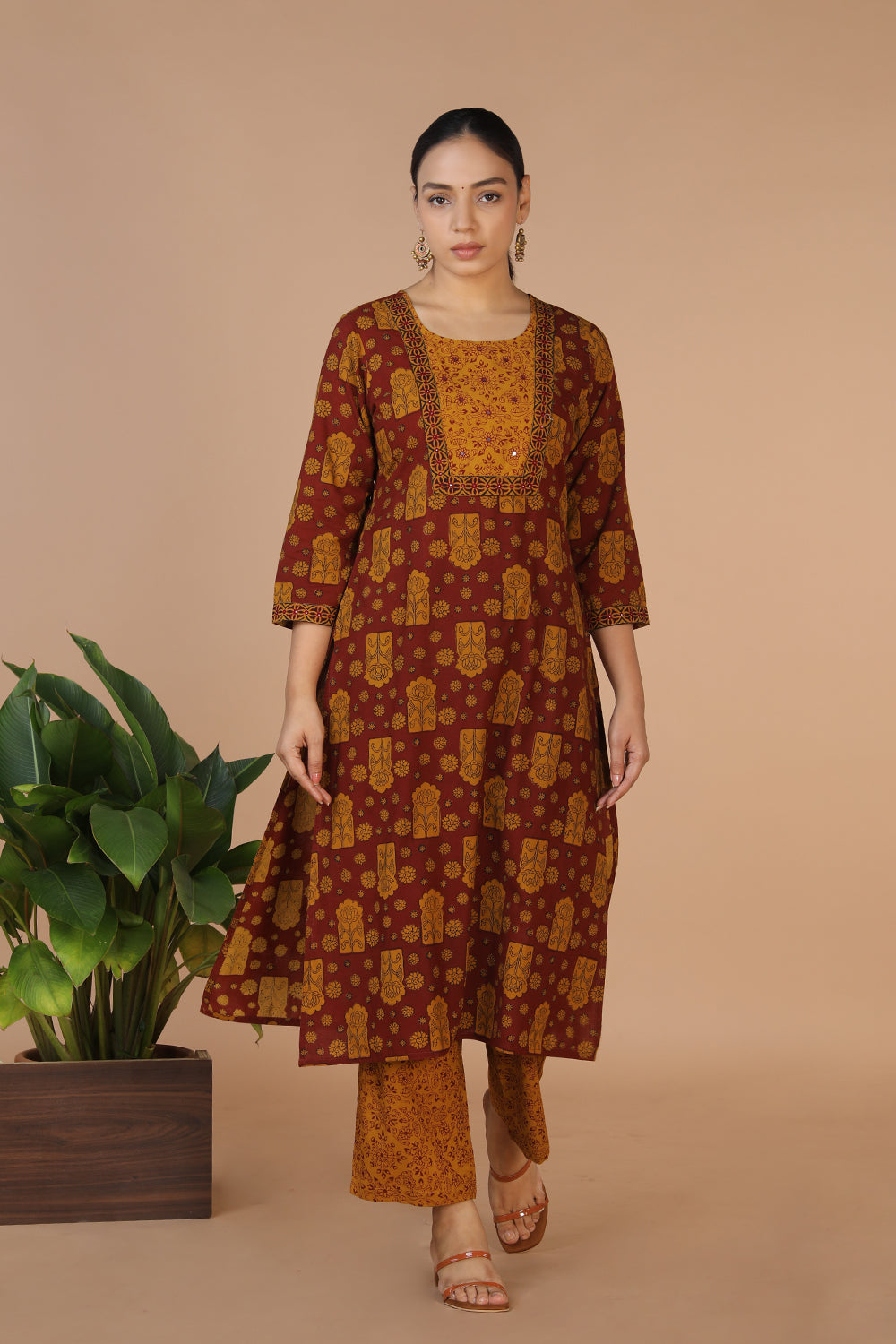 Collection of Bagh Handblock printed Kurta and pants set in a gallery layout