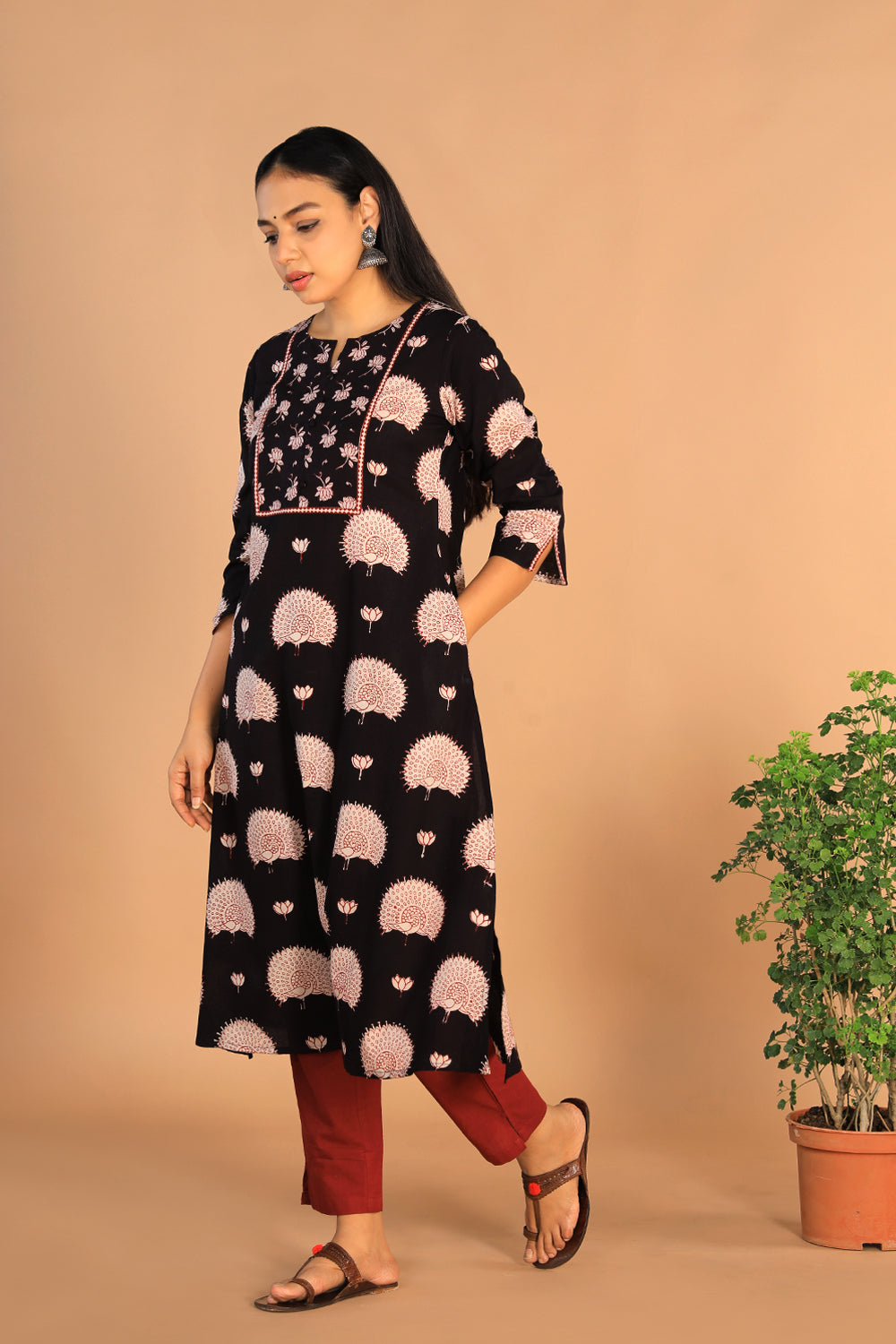 Collection of Charcoal black Cotton Bagh kurti in a gallery layout