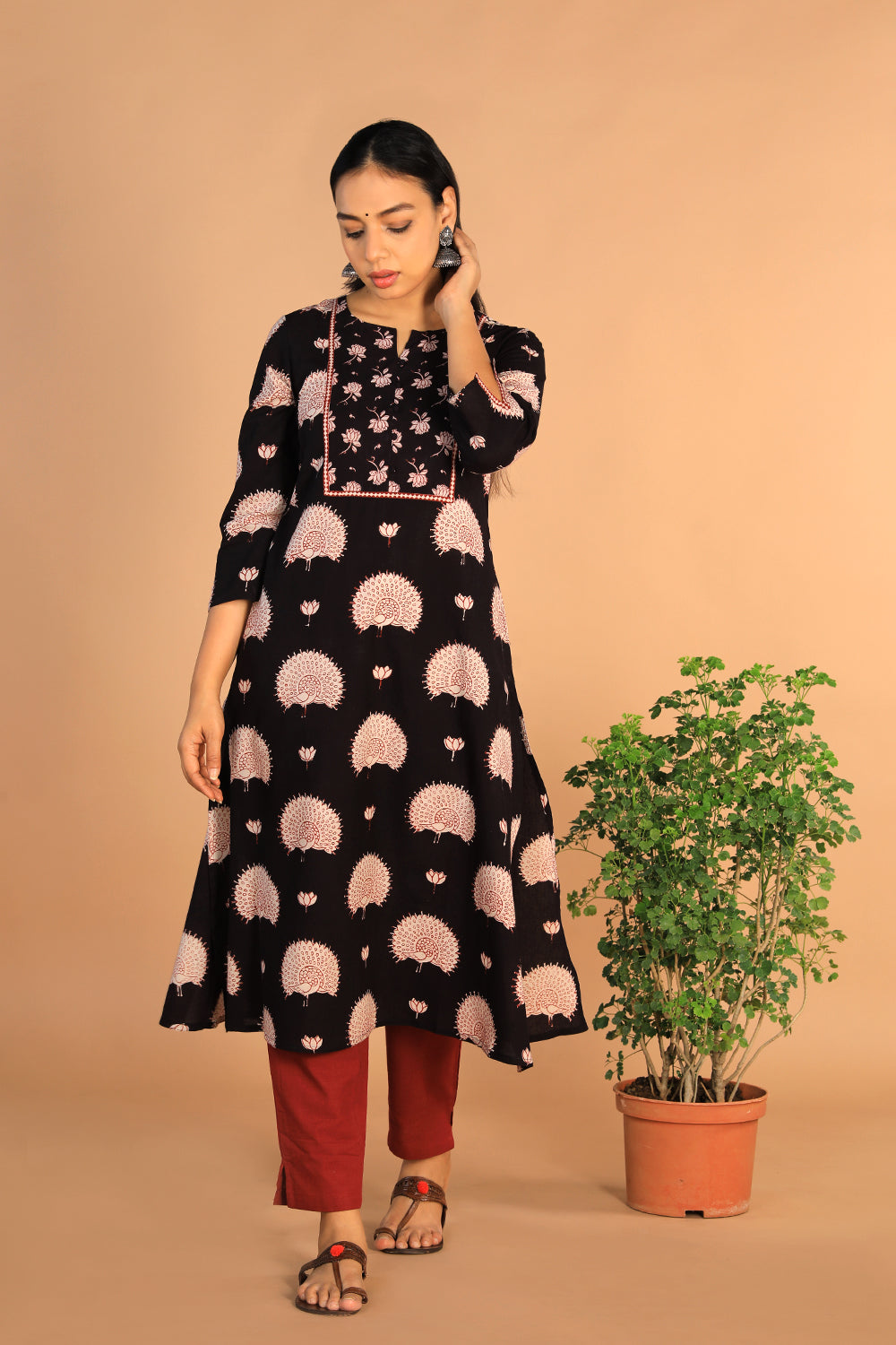 Collection of Charcoal black Cotton Bagh kurti in a gallery layout