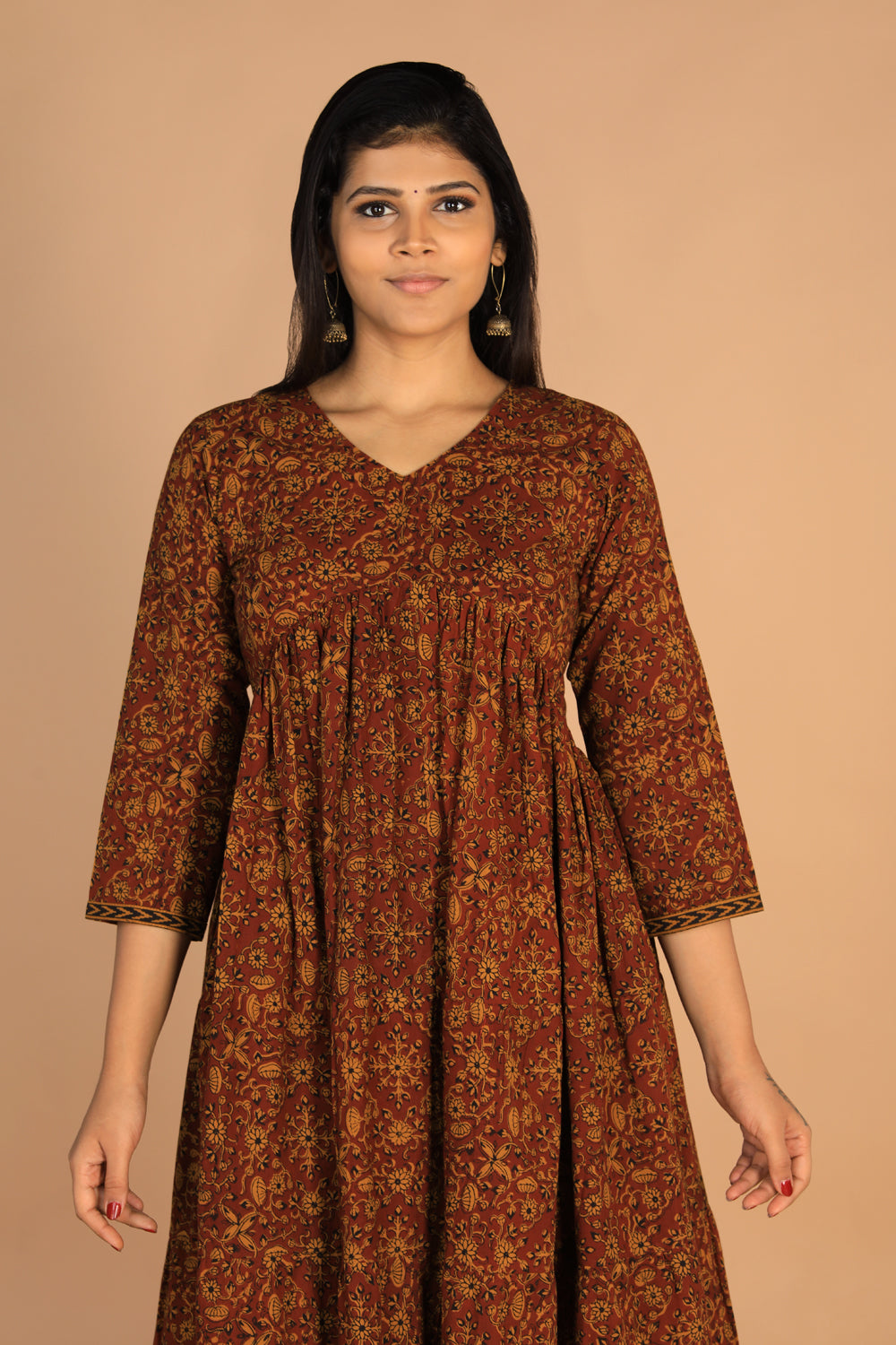 Collection of Bagh handblockprinted tiered cotton dress in a gallery layout