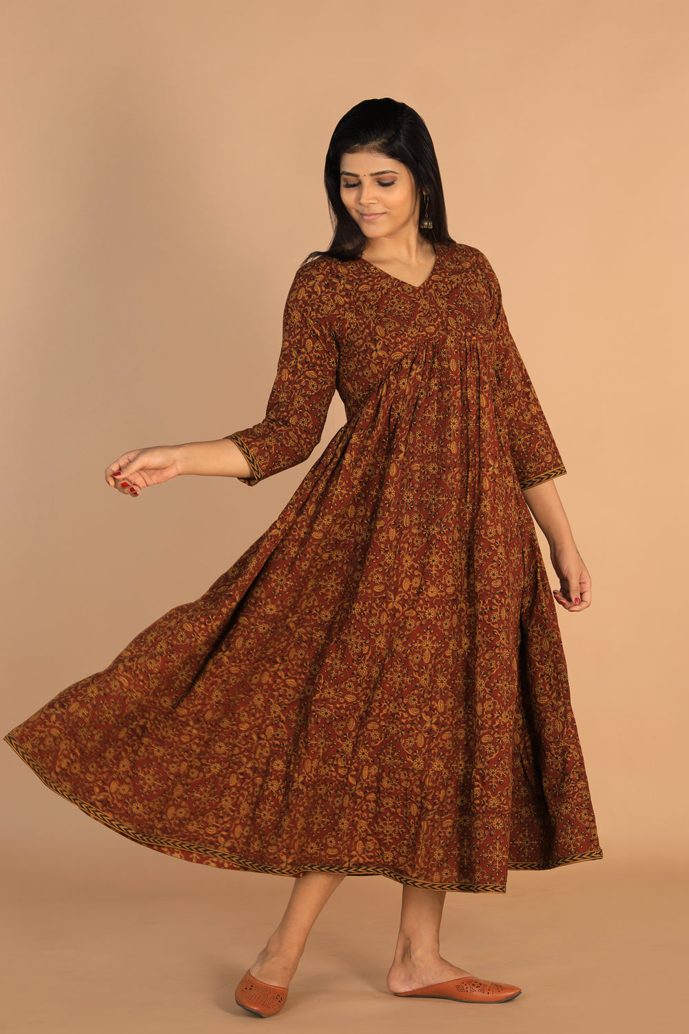 Collection of Bagh handblockprinted tiered cotton dress in a gallery layout