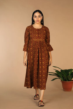 Collection of Cotton Bagh handblock printed gathered dress. in a gallery layout