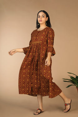 Collection of Cotton Bagh handblock printed gathered dress. in a gallery layout