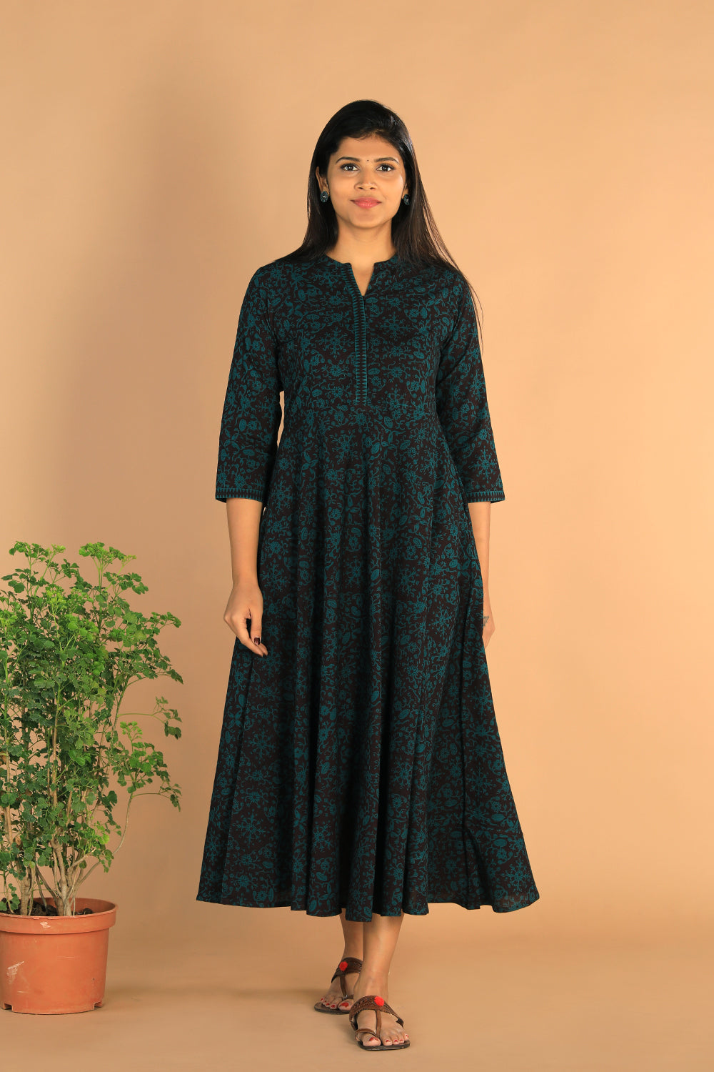 Collection of Cotton Bagh print dress in a gallery layout