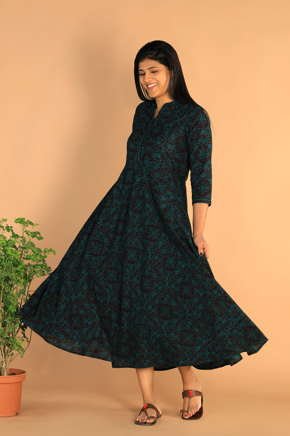 Collection of Cotton Bagh print dress in a gallery layout