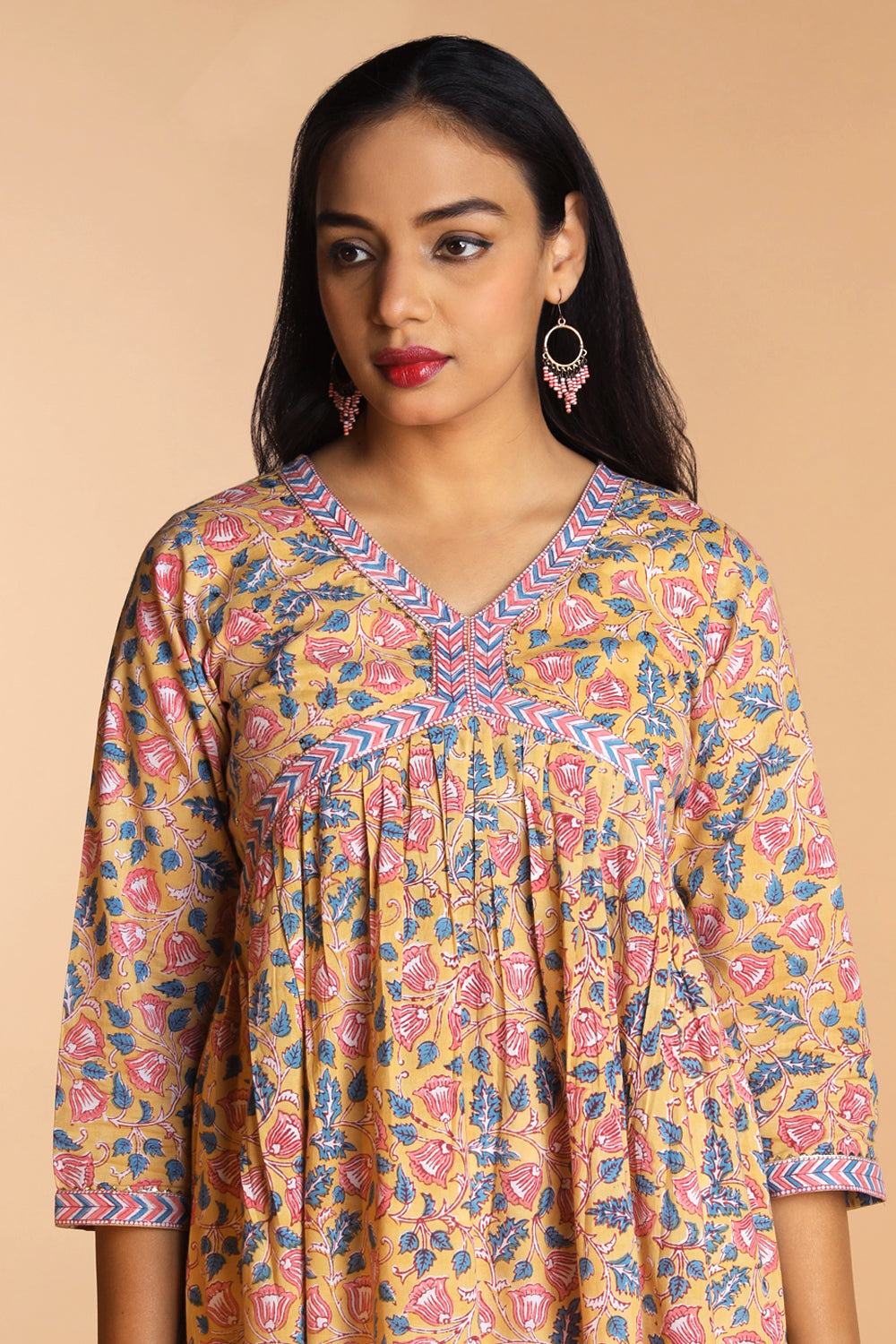 Collection of Floral Sanganeri hand block printed cotton Kurta in a gallery layout