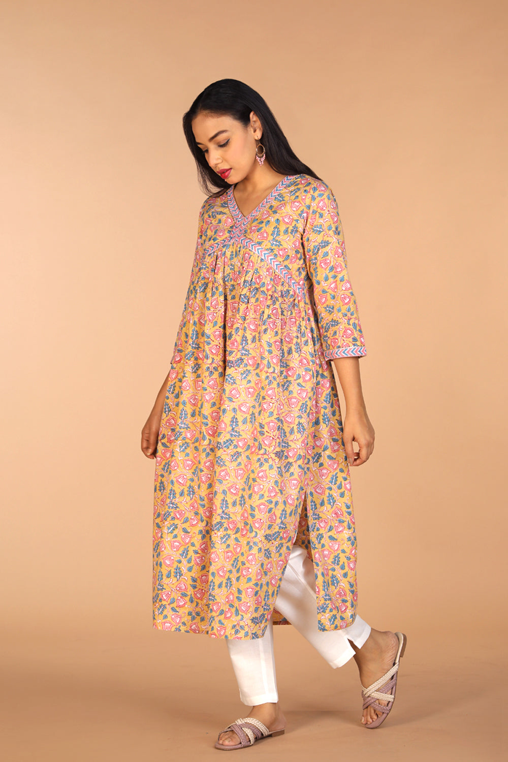 Collection of Floral Sanganeri hand block printed cotton Kurta in a gallery layout